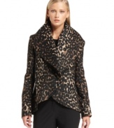 Calvin Klein merges soft shapes, clean lines and a bold animal print on this chic ponte-knit jacket. Perfect for pairing with sleek black pants or a pencil skirt. (Clearance)