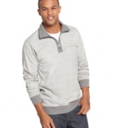 With a sporty quarter-zip style, this Geoffrey Beene sweater puts some zip on your weekend wardrobe.