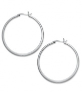 Take your look up a notch with simply stunning hoops. Touch of Silver's thin, polished design is crafted in silver-plated brass with a sterling silver click backing. Approximate diameter: 1-5/8 inches.