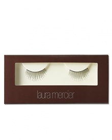 Laura Mercier Center Faux Eyelashes create the illusion of an open, wide eye to give a soft, feminine lift to the face. The delicate band of lashes are to be positioned directly over the center of the eye. To apply: Trim lashes to fit your lash line if necessary. Apply glue to base of lash set and wait 10 seconds. Position lashes just above natural lash line and hold in place to set.