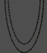 Polish and shine for miles! This long, onyx (5-6 mm and 7-8 mm) strand necklace adds elegance in layers and unique contrast to any look. Approximate length: 64 inches.