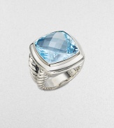 From the Albion Collection. A faceted cushion of dazzling blue topaz is framed in a sterling silver setting and split cable band.Blue topaz Sterling silver About ½ square Imported