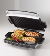 Get barbeque-style hot dogs or veggie burgers right in your kitchen with his new option from the George Foreman Grill line. It's large, 96-square-inch grill surface has room for multiple items at once and improved heat distribution. Other features include an oversize LED readout for variable temperature control and timer for cooking accuracy, a 1-inch floating hinge, a classic drip tray, a utensil that's gentle on the grill surface, and a silver metallic finish. Model GRP99.