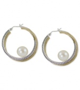 Abstract elegance. Cultured freshwater pearls (7-1/2-8 mm) stand at the center of 14k gold and sterling silver hoop earrings for a bit of postmodern appeal. Approximate diameter: 1-1/4 inches.