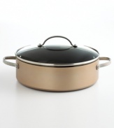 Crafted in bronze-hued, hard-anodized aluminum, this stunning sauteuse features an exclusive nonstick coating that allows you to sauté, sear and braise with little to no oil and sumptuous style. Also great as a casserole, it's ideal for oven-to-tabletop serving. Limited lifetime warranty.