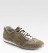 A suede sneaker without equal, finished with double-stitch construction and a debossed logo detail. Leather liningPadded insoleRubber soleMade in Italy