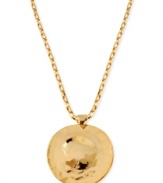 Roundabout fashion. The disc pendant necklace from Robert Lee Morris is crafted from gold-tone mixed metal and features a hammered look for a style twist. Approximate length: 17 inches + 3-inch extender. Approximate drop: 2 inches.