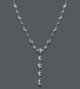 Say yes to elegance inspired by the ocean. This y-shaped necklace highlights round and oval-cut blue topaz gemstones (8-1/2 ct. t.w.) that shimmer in a 14k white gold setting. Approximate length: 17 inches. Approximate drop: 1-1/2 inches.