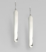 From the Saddle Collection. Exquisitely simple, subtly curved elongated ovals of polished sterling silver, sleek and shining. Sterling silverLength, about 1½Ear wireImported