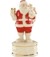 Enjoy the sights and sounds of Christmas. This musical figurine stars a classic Santa Claus on a pedestal of ivory porcelain with red, gold and beautiful scrolling detail. Plays Up On the Roof Top.