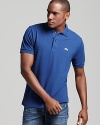 Lacoste's modern classic looks better than ever. The 2 button polo with the iconic alligator logo at the left chest.