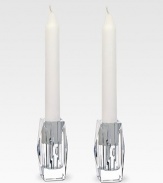 Stunning crystal candle holders are artisan-crafted in France to catch every candle's gentle flicker of light. From the Louxor Collection Set of 2 Fits standard taper candles Candle not included Hand wash 1¾W X 3¼H X 1¾D Made in France 