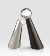 Elegantly evoking the southwest's rugged natural elements, the gleaming metal saltshaker leans into its black granite peppermill cousin. Tarnish-resistant metal Hand wash Salt shaker: 6½H X 2¾ diam. Peppermill: 7H X 2¾ diam. Imported 