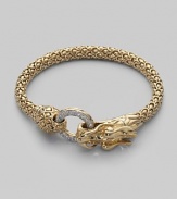 From the Naga Collection. A dragon inspired 18K gold creation with diamond pavé ring.Diamond, 0.48 tcw 18K gold Widest point, about 1¼ Bracelet width, about ¼ Hinge clasp closure Made in Bali