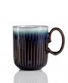 A rustic glaze, textured feel and rounded base make Denby's fluted mug a stylish go-to for cocoa, coffee and soup. Ultra-sturdy stoneware heats and reheats easily for everyday, anytime use.