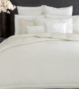 Crafted of luxe 400-thread count cotton sateen, these White Gold pillowcases from Donna Karan features chic pleating along the hem for a polished look.