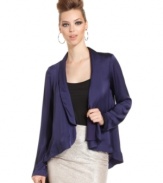 A back cutout and ruffled hem ups the fashion cred on this BCBGeneration jacket -- perfect for a fall layered look!