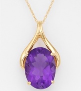 A beautiful and elegant 14k gold wishbone setting suspends an oval-cut amethyst (9 ct. t.w.) pendant. Chain measures 18 inches.