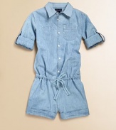 A classic chambray workshirt transforms into a casual, playful romper, featuring a drawstring waist, rolled-up sleeves and a cuffed hem.Spread collar with button frontLong sleeves with single button cuffs and interior button straps for rollingRear elasticized waist with drawstring frontPatch pockets at chest and on-seam hand pocketsCuffed hemCottonMachine washImported