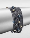 From the Chain Collection. A fluid design with multiple rows of blackened sterling silver box chains accented with 18k gold, hematite and blue topaz stations. Blackened sterling silver18k gold, hematite and blue topaz beadsLength, about 7.25Bar clasp closureImported 