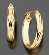 With a slightly elongated hoop, these gorgeous 14k gold earrings wear beautifully from work to weekend. Approximate diameter: 1/2 inch. Approximate drop: 3/4 inch.