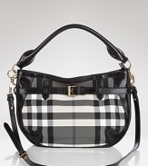 Let the British invade your closet in high style with Burberrry's signature check crossbody. Shoulder the black and white bag for timeless chic over cashmere and a color-pop coat.