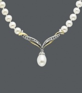 Accent your neckline with the perfect sparkling sophistication. This v-shaped necklace combines cultured freshwater pearls (5-9mm) and sparkling diamond accents. Set in sterling silver and 14k gold. Approximate length: 17 inches. Approximate pendant drop: 1/2 inch.