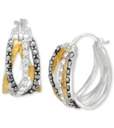 A woven mix of sparkle and shine. Genevieve & Grace's chic crisscross hoop earrings are crafted from sterling silver and 18k gold over sterling silver with glittering marcasite accents. Approximate diameter: 3/4 inch.