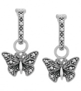 Soar to new heights of style. These drop earrings from Genevieve & Grace are set in sterling silver with marcasite adding luster to the butterfly motif. Approximate drop length: 1 inch. Approximate drop width: 1/2 inch.