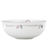 Hummingbirds twirl and buzz from flowery pink leaves to blue on this dreamy bone china serving bowl from Lenox Lifestyle dinnerware. The dishes from the Silver Song collection are crisscrossed with platinum branches and abound with fanciful springtime delight and irresistible modern charm. Qualifies for Rebate