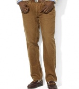 An essential corduroy pant is constructed with a traditional five-pocket jean silhouette for a classic look.