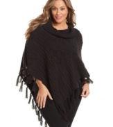 Wrap yourself in the chic warmth of Style&co.'s plus size poncho sweater, finished by a cowl neckline and tassels.