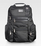 An endlessly versatile, always casual backpack design for business, school, commuting and travel in durable ballistic nylon. Zip closure Top handles Shoulder straps Exterior zip pockets Interior zip pockets, divider wall Nylon with leather accents 12W X 17H X 6D Imported 