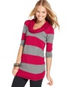 Integrate a powerful print into your closet of knits with this striped, cowl neck tunic from Pink Rose!