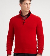 Expert craftsmanship combined with luxurious fabrics lends a refined finish to a classic pullover sweater, crafted from rich Italian cashmere with a mockneck and a four-button placket for a modern finish.Four-button placketMockneckRibbed knit collar, cuffs and hemCashmereDry cleanImported of Italian fabric