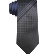 A subtle pattern in a skinny shape makes this Bar III tie the most modern approach to dresswear.