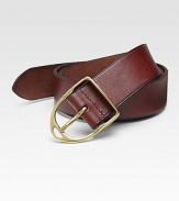 A clean, finishing touch to any ensemble, crafted in smooth vegetable-tanned leather with am equestrian-inspired harness buckle of brushed brass.LeatherAbout 1½ wideImported