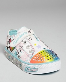 Nothing gets her dancing like Skecher's fabulous twinkling-toe sneaker, adorned with a giddy array of prints, sequins and lights that sparkle with every step.