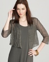 A sheer fabric and shrunken fit spice up this Eileen Fisher cardigan. Layer it over a cotton dress for easy summer style.