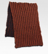 A versatile two-toned scarf is perfectly knitted to keep you warm and cozy all winter long.About 16W x 69LAcrylicDry cleanImported