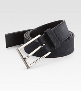 A brilliant, logo embossed silver buckle fastens this wardrobe essential of soft suede.SuedeAbout 1 wideImported