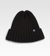 Stay forever warm and toasty in this ribbed knit beanie accented with logo detail.AcrylicSpot cleanImported