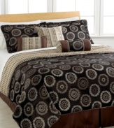 Under the sun. A modern sunburst design lends sleek sophistication to the bedroom in this jacquard woven Sunburst comforter set, featuring a dramatic, earthy palette. Reverses to an allover dot pattern in coordinating hues. Finished with decorative twisted cord and tassel accents for a touch of charm.