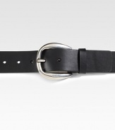 A nubuck leather belt with round buckle and cut-out logo detail. Dark palladium buckle 1.6 wide Made in Italy 