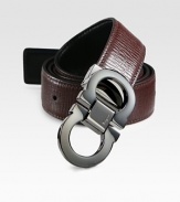 Smooth on one side and textured on the other, this reversible belt crafted in smooth Italian leather with double gancini buckle, will be a versatile addition to your existing wardrobe.LeatherAbout 1½ wideMade in Italy