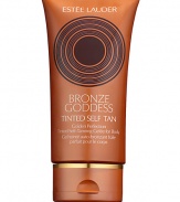 Give yourself a heavenly, sun-kissed tan with Bronze Goddess Golden Perfection Tinted Self-Tanning Gelée for Body. Goes on silky-smooth, with a transfer-resistant, soft shimmer bronze tint that's simply divine. Advanced tan-perfecting technology is proven to deliver your most natural-looking shade ever, with color starting to develop in under an hour. Color deepens with repeated use. Light beachy scent. Bring out the bronze goddess in you. 5 oz. 