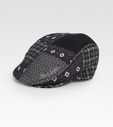 A signature array of distinctive prints and patterns adorns this traditional driver cap style, rendered in an exquisite blend of Italian wool and silk.50% silk/25% polyester/25% woolDry cleanImported of Italian fabric