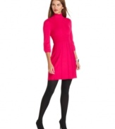 Cozy up in Spense's petite sweater dress featuring a comfy turtleneck and flattering A-line shape!