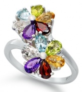 Petal perfection. Two vibrant flowers adorn this pretty wrap ring. Crafted in sterling silver with pear-cut blue topaz (3/8 ct. t.w.), light citrine (1/3 ct. t.w.), garnet (1/2 ct. t.w.), amethyst (3/8 ct. t.w.), peridot (3/8 ct. t.w.) and white topaz (3/8 ct. t.w.). Size 7.