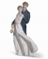 Celebrate your eternal love with this charming porcelain figurine from Lladro. The intricate detail and endearing sentiment make this piece a lovely gift for any special couple.